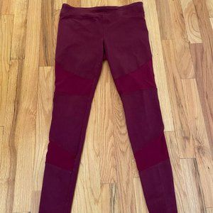 High-waisted maroon workout leggings